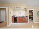 Basement bar complete with under-counter mini fridge at 2769 Independence Way, Gastonia, NC 28056