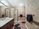 Bathroom with glass shower, designer vanity and patterned tile floor at 2769 Independence Way, Gastonia, NC 28056