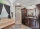 Well-lit bathroom featuring a tub, glass shower, and vanity with countertop space at 2769 Independence Way, Gastonia, NC 28056