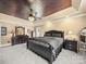 Serene main bedroom featuring a tray ceiling, ceiling fan, and comfortable furnishings at 2769 Independence Way, Gastonia, NC 28056