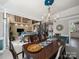 Elegant dining room featuring a chandelier and views of the living area at 2769 Independence Way, Gastonia, NC 28056