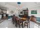 Charming dining area with a large table, elegant chandelier, and decorative wall accents at 2769 Independence Way, Gastonia, NC 28056