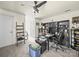 Home office with black ceiling fan, desk, cabinets, and shelving at 2769 Independence Way, Gastonia, NC 28056