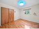 Bright bedroom with wood floors, a double door closet, and a sunny window at 2831 Puetts Chapel Rd, Bessemer City, NC 28016