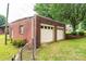 Detached two-car garage with brick siding, providing ample parking and storage space at 2836 20Th Street Ne Ln, Hickory, NC 28601