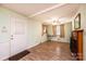 Cozy living room featuring a fireplace, ceiling fan and light green walls at 2836 20Th Street Ne Ln, Hickory, NC 28601