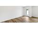 Bright living room featuring wood floors and a doorway with natural light at 3140 Ora Smith Rd, Lincolnton, NC 28092