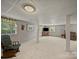 Finished basement featuring carpeted floors, painted concrete walls, and plenty of natural light at 3509 Flint Dr, Statesville, NC 28677