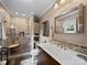 Modern bathroom with a glass-enclosed shower, dual sinks, and stylish tile accents at 3509 Flint Dr, Statesville, NC 28677