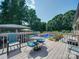 Spacious deck and in-ground pool is perfect for entertaining on a summer day at 3509 Flint Dr, Statesville, NC 28677