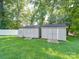 Matching sheds with double doors and ramps for easy access, providing ample outdoor storage space at 3509 Flint Dr, Statesville, NC 28677
