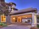 Covered entrance featuring stone and tile design, pillars, and lighting at 355 Pelham Ln, Mooresville, NC 28115
