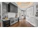 Modern kitchen with high-end stainless steel appliances, custom cabinetry, and a large central island at 355 Pelham Ln, Mooresville, NC 28115
