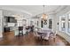 Open-concept kitchen with large center island, breakfast bar, and modern lighting at 355 Pelham Ln, Mooresville, NC 28115