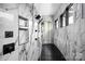 This shower has a black tile floor, marble walls, and dual shower heads at 355 Pelham Ln, Mooresville, NC 28115