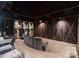 Home theater with comfortable seating, a large screen, and custom wall decor for an immersive viewing experience at 355 Pelham Ln, Mooresville, NC 28115