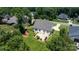 Aerial of home showing patio, manicured lawn and perimeter of lush landscaping and mature trees at 3622 46Th Ne Ave, Hickory, NC 28601
