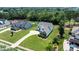 Aerial view of a house and surrounding lawn in a wooded neighborhood on a sunny day at 3622 46Th Ne Ave, Hickory, NC 28601