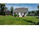 Spacious backyard with healthy lawn, a patio, and well placed perimeter landscaping at 3622 46Th Ne Ave, Hickory, NC 28601
