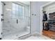 Bathroom featuring tile shower with glass enclosure and walk-in closet at 3622 46Th Ne Ave, Hickory, NC 28601