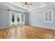 A spacious bedroom with trey ceiling and multiple large windows for natural light at 3622 46Th Ne Ave, Hickory, NC 28601