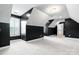 Finished bonus room with a large window, carpet, and black and white walls at 3622 46Th Ne Ave, Hickory, NC 28601