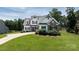 Beautiful two-story home with stone accents, a three-car garage, and manicured landscaping at 3622 46Th Ne Ave, Hickory, NC 28601