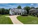 Traditional two-story home featuring a three-car garage and well-manicured lawn at 3622 46Th Ne Ave, Hickory, NC 28601
