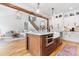 Open concept kitchen with marble countertop, a view into the living room and staircase at 3622 46Th Ne Ave, Hickory, NC 28601