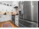 Modern kitchen featuring stainless steel appliances, ample counter space, and elegant white cabinets at 3622 46Th Ne Ave, Hickory, NC 28601
