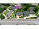 Aerial view of property showing the home's location on a tree-lined street with well-manicured lawns at 4015 Randolph Rd, Charlotte, NC 28211