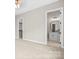 Neutral bedroom with carpet and an open view to a bathroom at 4015 Randolph Rd, Charlotte, NC 28211