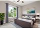 Relaxing bedroom with large window and a cozy bed at 4015 Randolph Rd, Charlotte, NC 28211