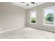 Bright bedroom features two large windows offering lots of natural light and outdoor views at 4015 Randolph Rd, Charlotte, NC 28211