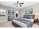 Staged bedroom features hardwood floors, modern furniture and stylish decor at 4015 Randolph Rd, Charlotte, NC 28211