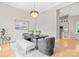 Elegant dining room with a modern chandelier, stylish decor, and comfortable seating at 4015 Randolph Rd, Charlotte, NC 28211