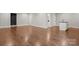 Spacious living room features hardwood floors and neutral paint at 4015 Randolph Rd, Charlotte, NC 28211