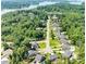 Aerial view of home in a lush, green community with boat storage and lake access at 4017 Halyard Dr, Denver, NC 28037