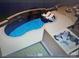 Rendering of an in-ground swimming pool with sun shelf loungers, a hot tub, and an outdoor fire pit at 4017 Halyard Dr, Denver, NC 28037