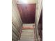 Attic access point with wooden frame and unfinished wooden planks at 408 Moose St, Albemarle, NC 28001