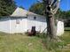 The property has a shed with chair outside at 408 Moose St, Albemarle, NC 28001