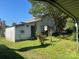 The property has a shed with a large tank on the back at 408 Moose St, Albemarle, NC 28001