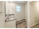 Modern bathroom features a double vanity, granite countertop, wood-look floor, and great lighting at 414 1St Avenue Se None, Hickory, NC 28602
