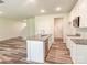 Modern kitchen with stainless steel appliances, granite counters, and an island with a sink at 414 1St Avenue Se None, Hickory, NC 28602