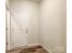 Functional mudroom with a door to the outside, providing a convenient transition space at 414 1St Avenue Se None, Hickory, NC 28602