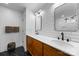 Modern bathroom featuring a double vanity, hexagon tile floor, and subway tile backsplash at 415 N Church St # 311, Charlotte, NC 28202