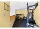 Exercise room with a variety of equipment, including a weight rack and exercise bike at 415 N Church St # 311, Charlotte, NC 28202