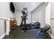 Elliptical machine and shelving in community fitness room at 415 N Church St # 311, Charlotte, NC 28202