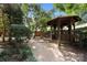 Landscaped garden path leads to the gazebo at 415 N Church St # 311, Charlotte, NC 28202