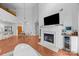 Bright and spacious living room with a modern fireplace, mini bar, and soaring ceilings at 415 N Church St # 311, Charlotte, NC 28202